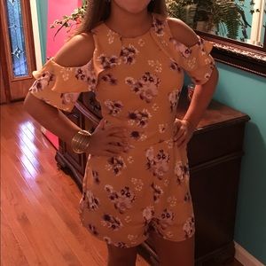 Mustard floral romper with ruffles on shoulder